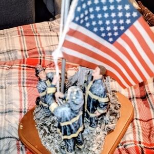 Patriotic Firefighter Figurine with American Flag